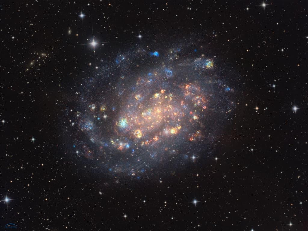 NGC 300: A Cosmic Gemstone with Stars and Gas Clouds